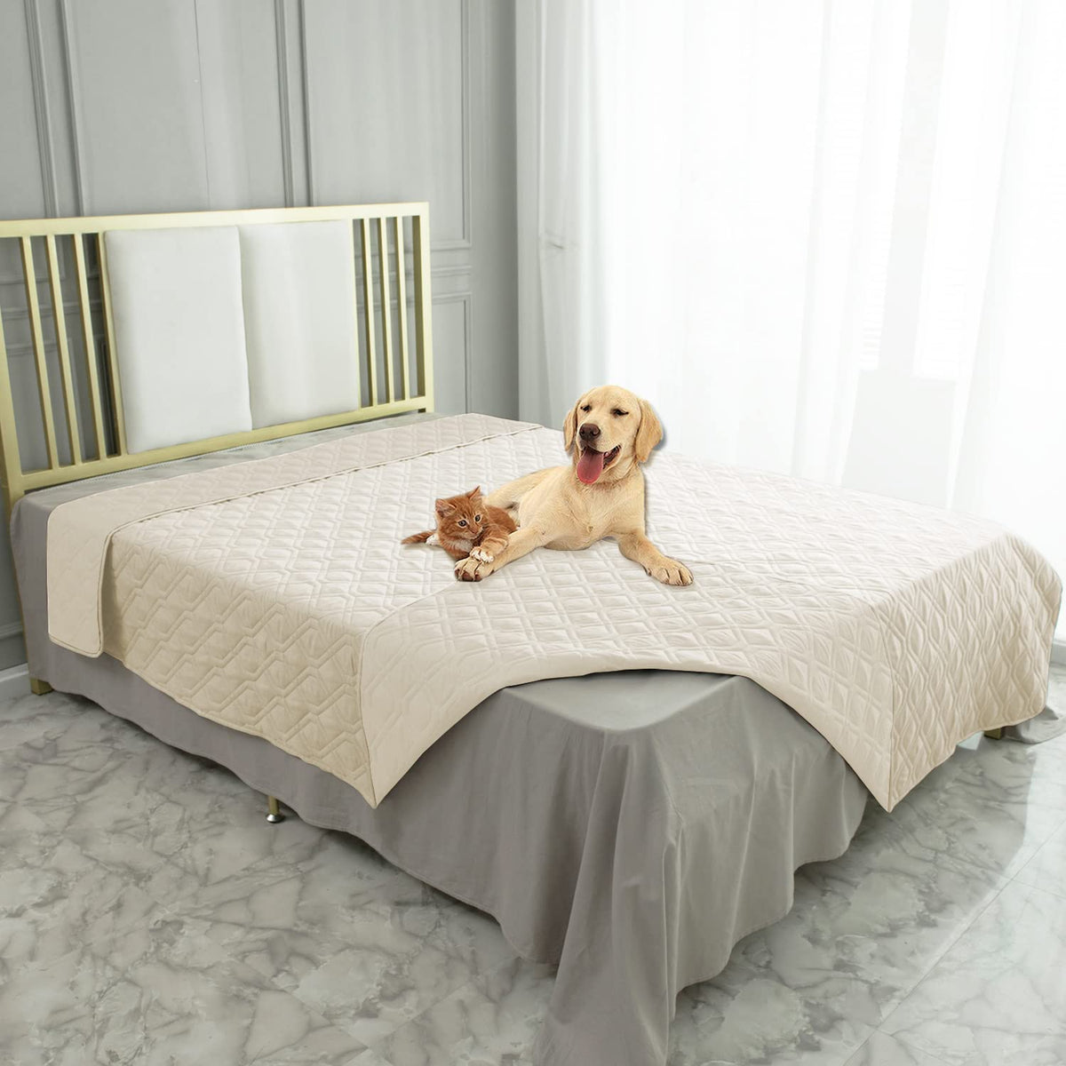 Ameritex waterproof blanket cover on sofa protects furniture from spills and moisture.