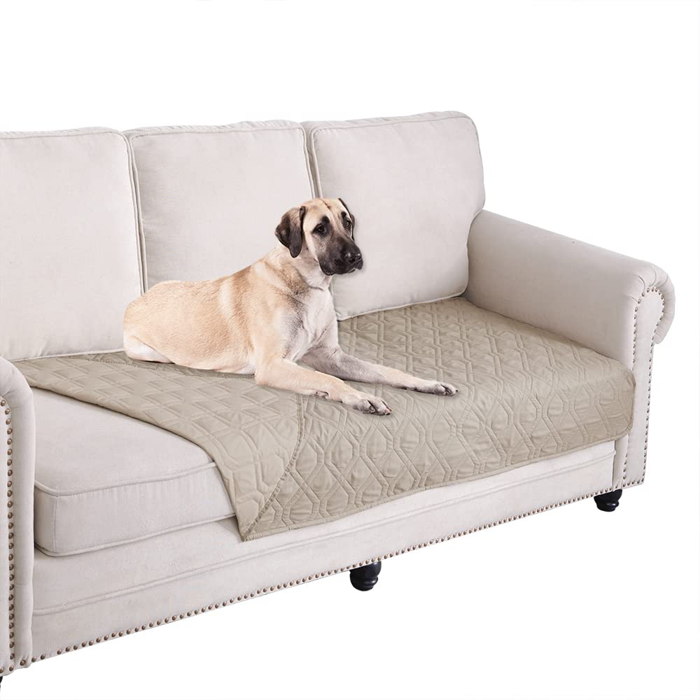 Ameritex waterproof blanket reverses on sofa, protecting furniture from pet use.