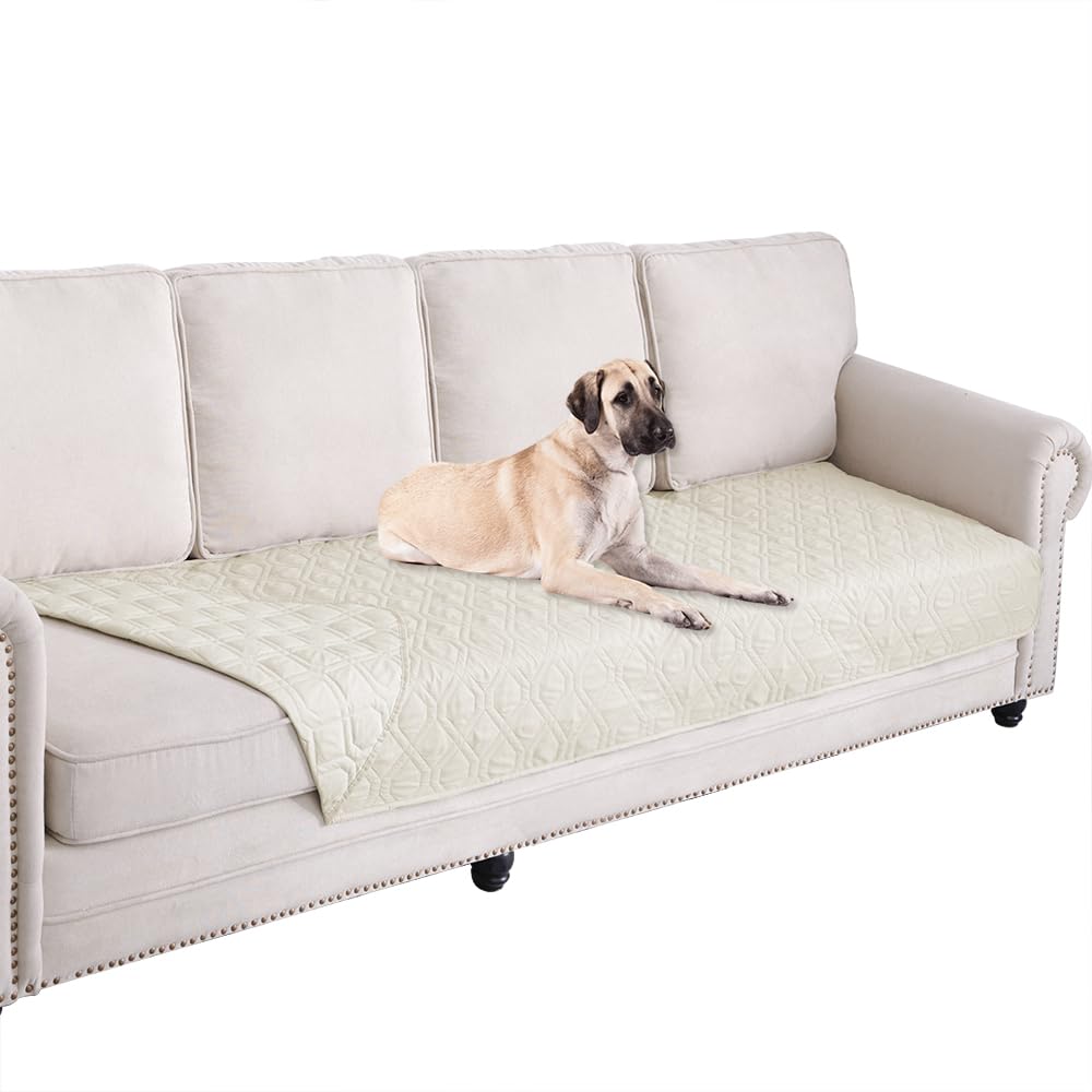 Ameritex waterproof blanket on a sofa protects from spills and pet accidents.