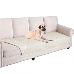 Ameritex waterproof blanket on a sofa protects from spills and pet accidents.