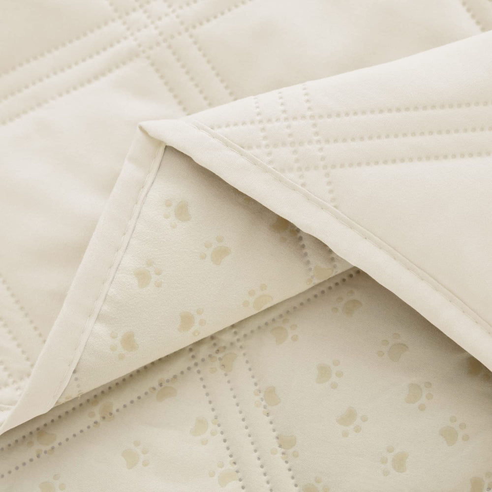 Ameritex bed cover over a bed shows five-layer construction.