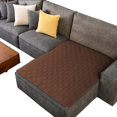 Ameritex waterproof dog bed cover on a sofa protecting furniture from spills.