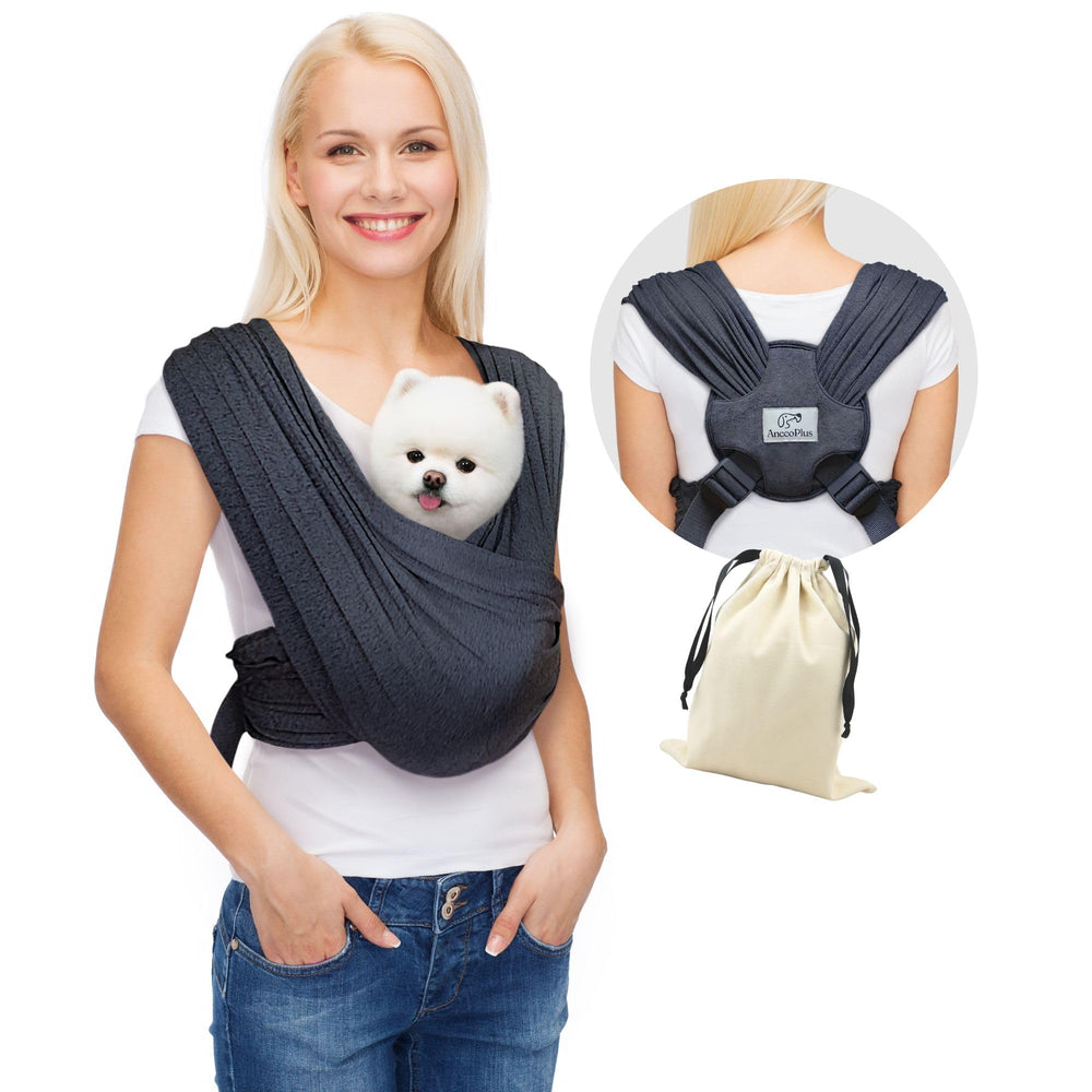 AnccoPlus front-facing dog carrier in red worn for hands-free comfort and chest security.