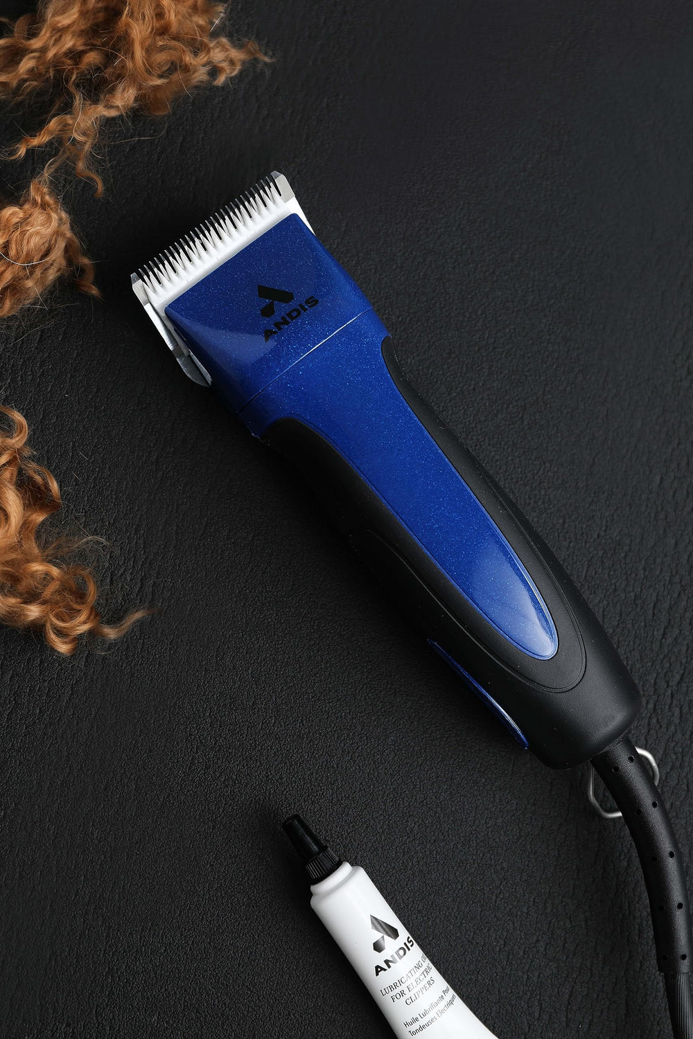 Andis Excel clipper features a 14-foot cord for freedom.