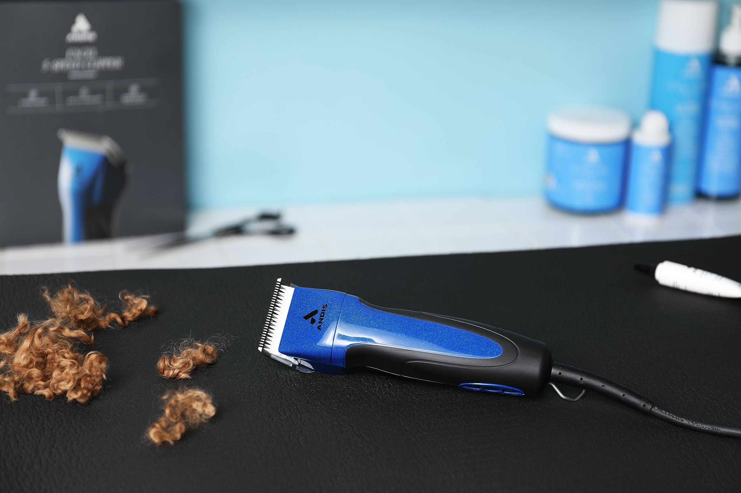 Andis Excel CeramicEdge blade stays cool and sharp.