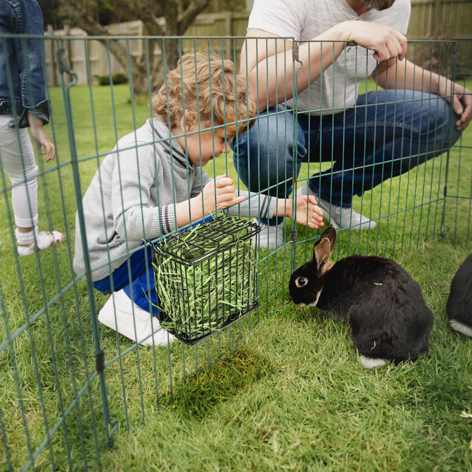 Andounier hay rack keeps cage clean and hay waste to a minimum.