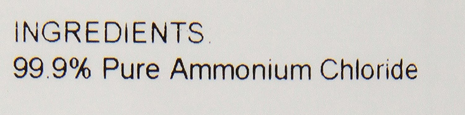 Close-up of ANIMED ammonium chloride powder beside fresh water for goats and cattle.