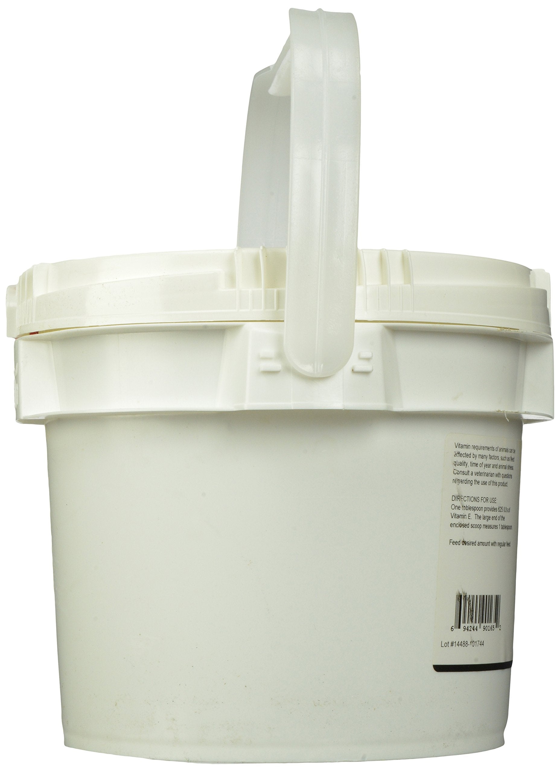 ANIMED Vitamin E Powder being prepared for mixing into feed.