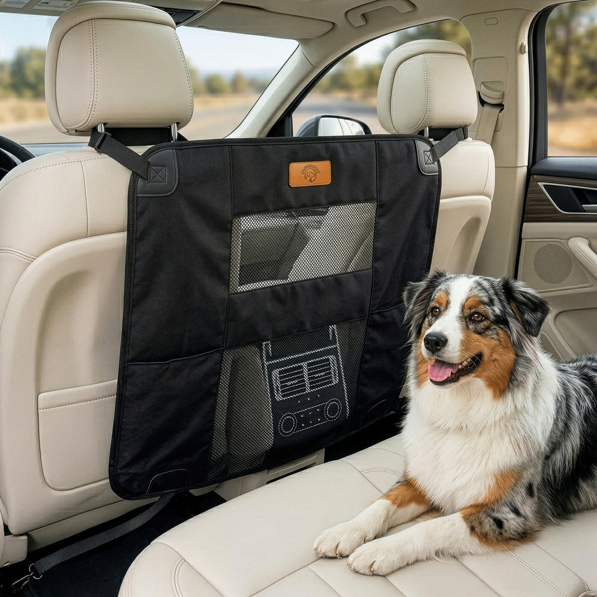 AnimoGoods dog car barrier mounted between front seats for secure travel.