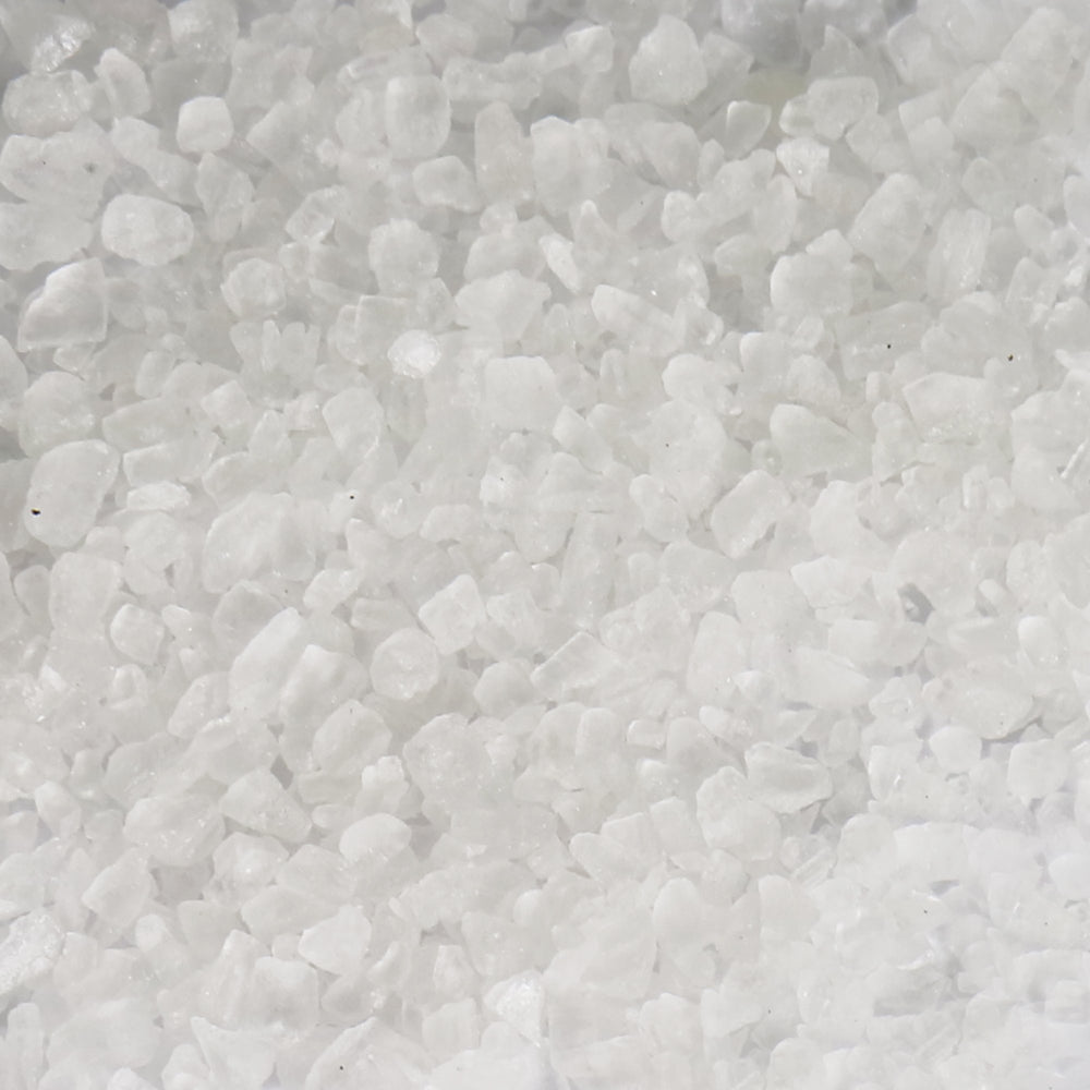 API Aquarium Salt 16-ounce dissolving in water to support electrolytes
