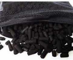 Aquapapa activated charcoal promotes clearer water in a thriving aquarium.
