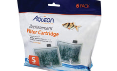 Aqueon filter cartridge being rinsed under water to remove carbon dust before installation.