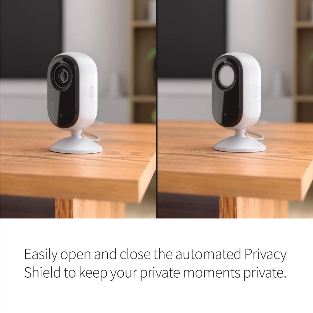 Arlo Essential Indoor Camera HD privacy shield closes the lens for privacy.