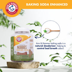 Dog chewing Nubbies treats as part of daily oral care routine