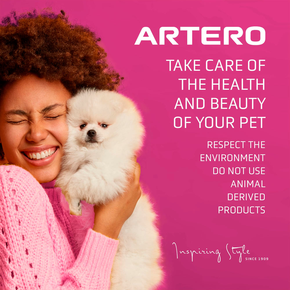 Professional groomer applies Artero Protein Vital for repair and shine.