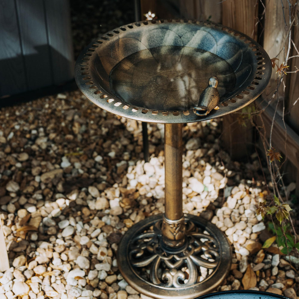 Backyard Expressions bird bath bronze finish pedestal, showing sturdy resin construction for outdoor use.