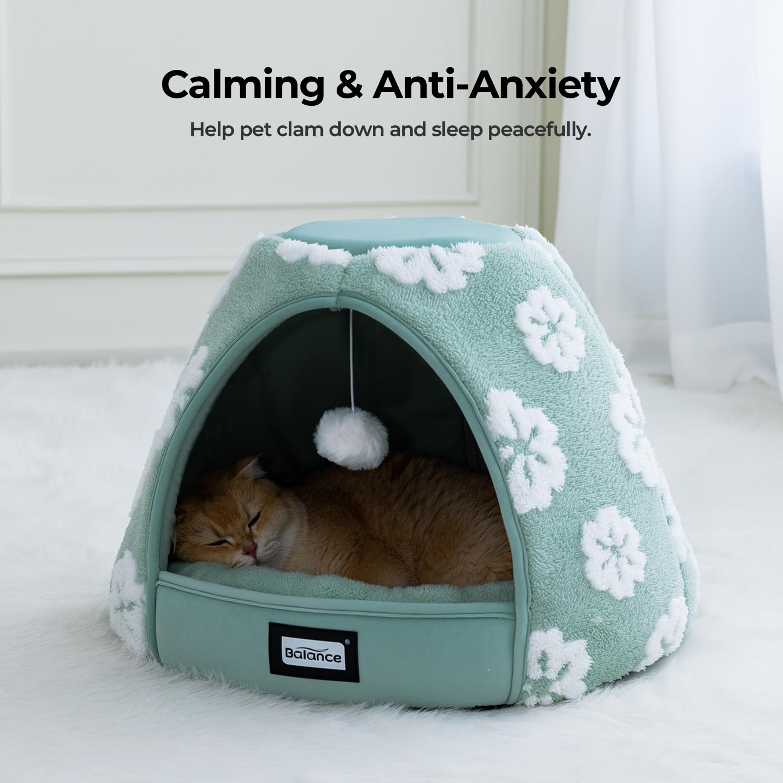 BALANCE Cat Bed hanging toy ball at the entrance for interactive play.