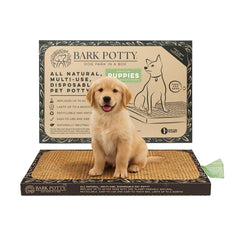 Bark Potty puppy-teething-use demonstrates a chew-friendly potty for teething puppies indoors.