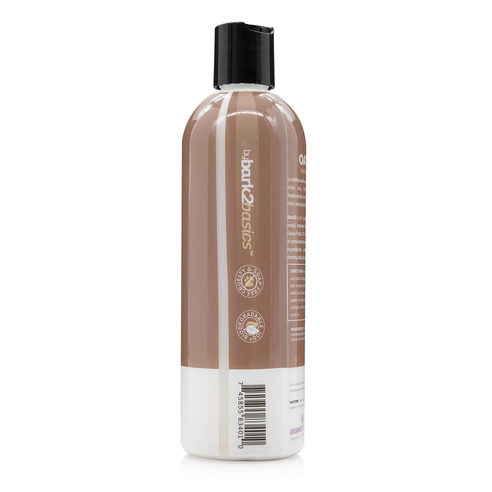 The Bark2Basics Oatmeal Dog Shampoo label close-up, natural ingredients highlighted.