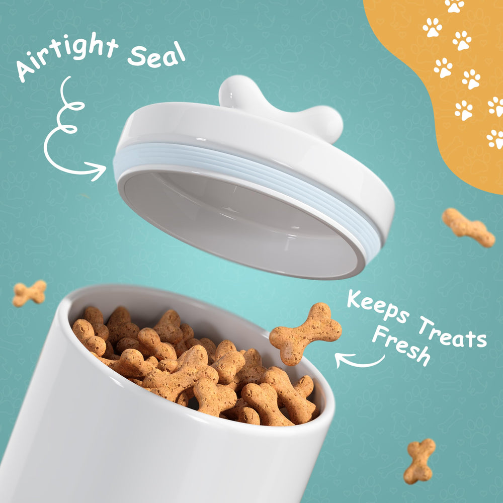Barnyard Designs white dog treat canister on a kitchen counter display.