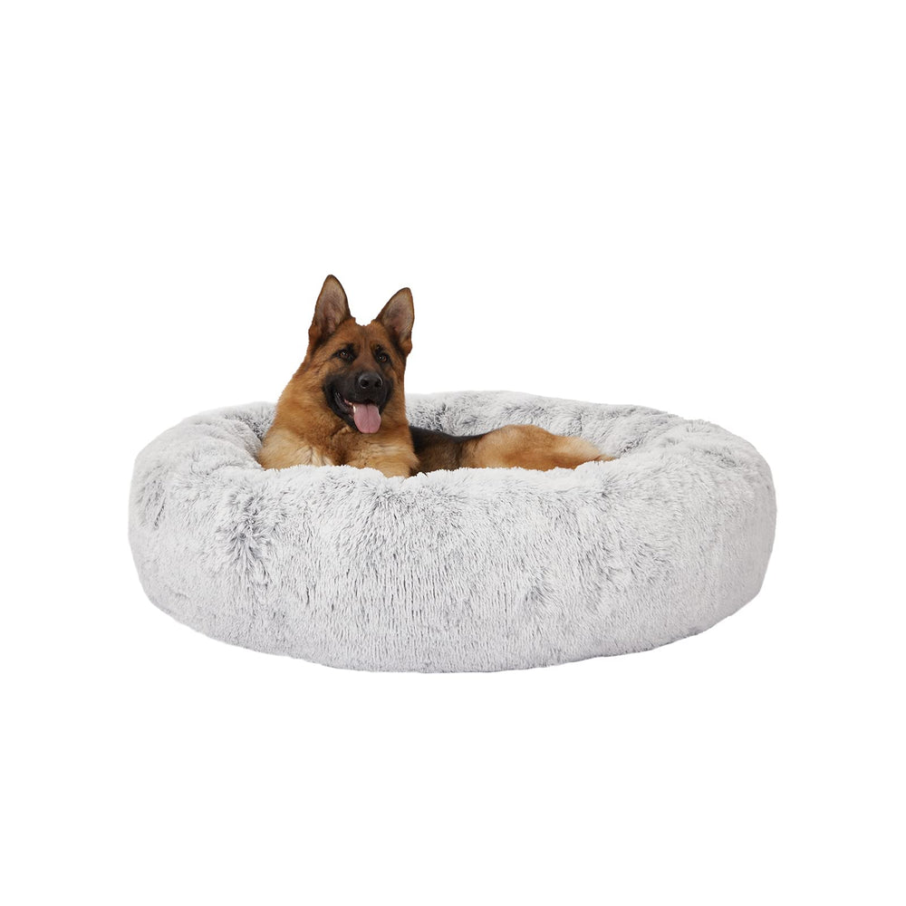 Bedfolks Calming Donut Bed promotes relaxed lounging after play.