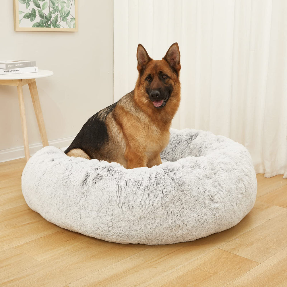 Bedfolks Donut Bed with soft faux fur delivers cozy warmth for dogs.