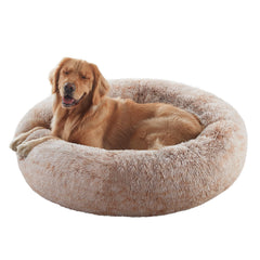 BedStill 36in donut dog bed provides a secure, calming space for large dogs
