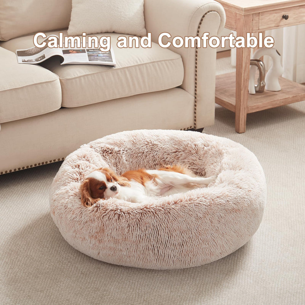 BedStill donut dog bed round shape with raised sides provides calm comfort for pets.