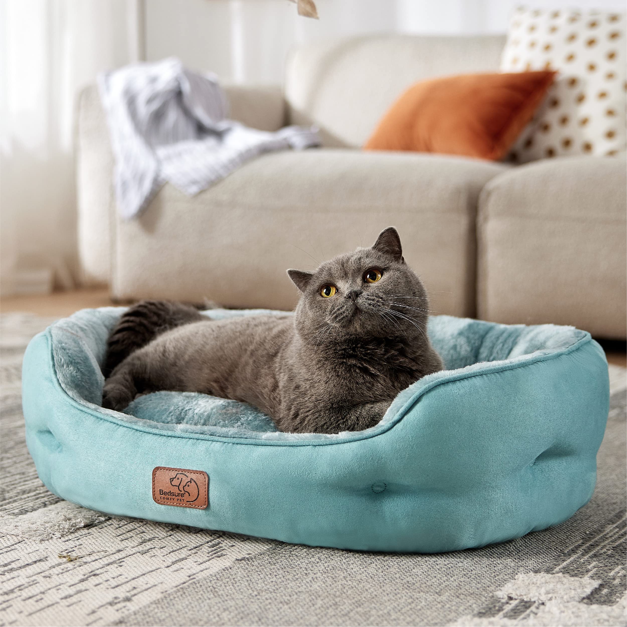 Deeply cushioned bolster providing head and neck support for comfortable lounging.