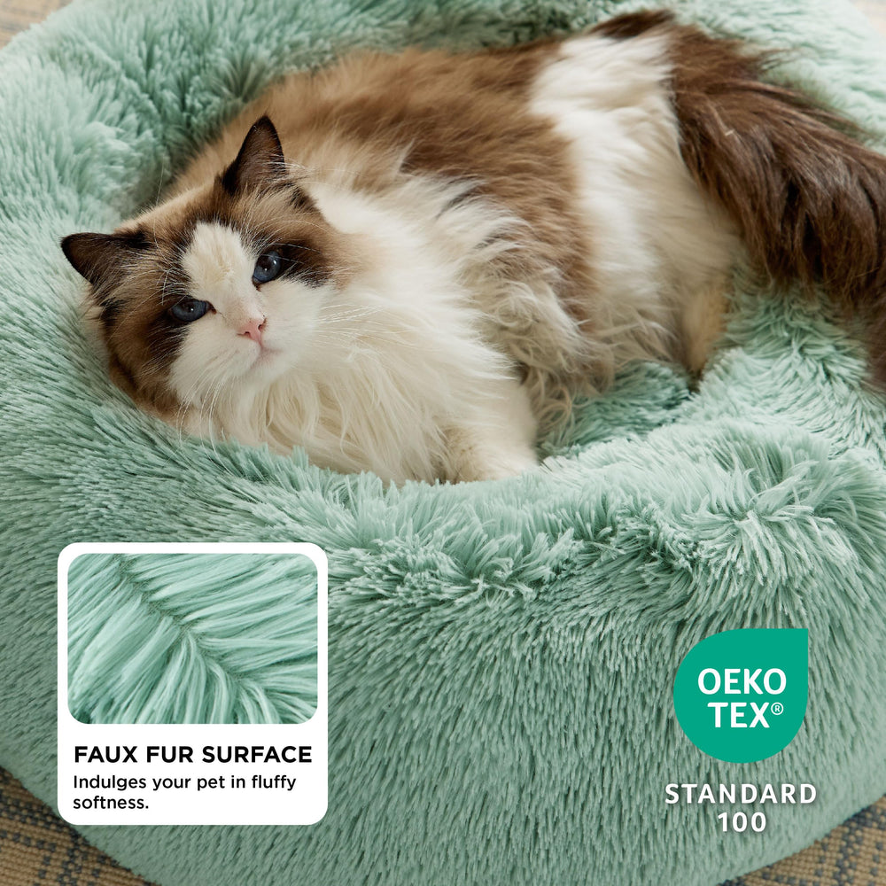 Bedsure calming cat bed plush faux fur for curling up and snuggling.