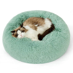 Bedsure calming cat bed in garden green, round shape with soft plush for cozy naps.