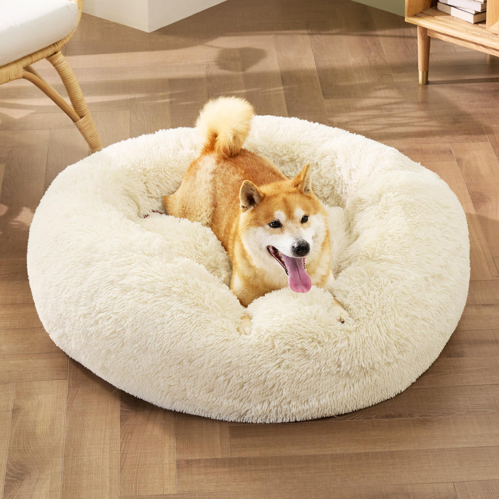 Bedsure calming donut bed raised rim supports head and neck.