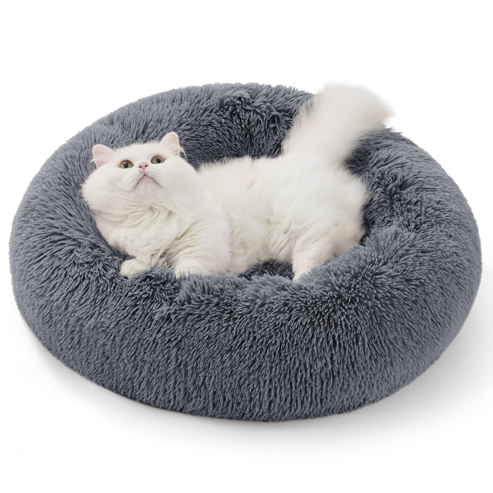 Bedsure Calming Donut Cat Bed with plush cushion for cozy naps.
