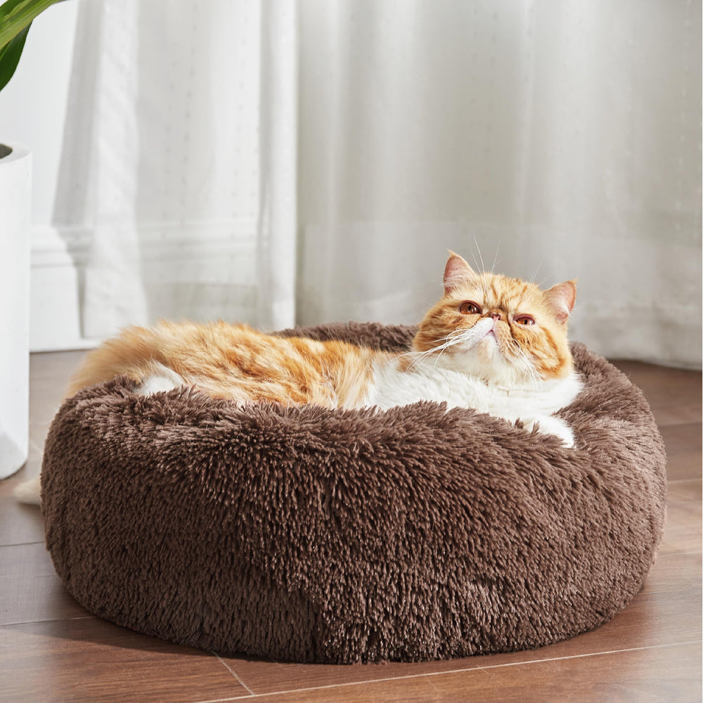 Bedsure cozy round cat bed with fluffy faux fur lining for warm resting