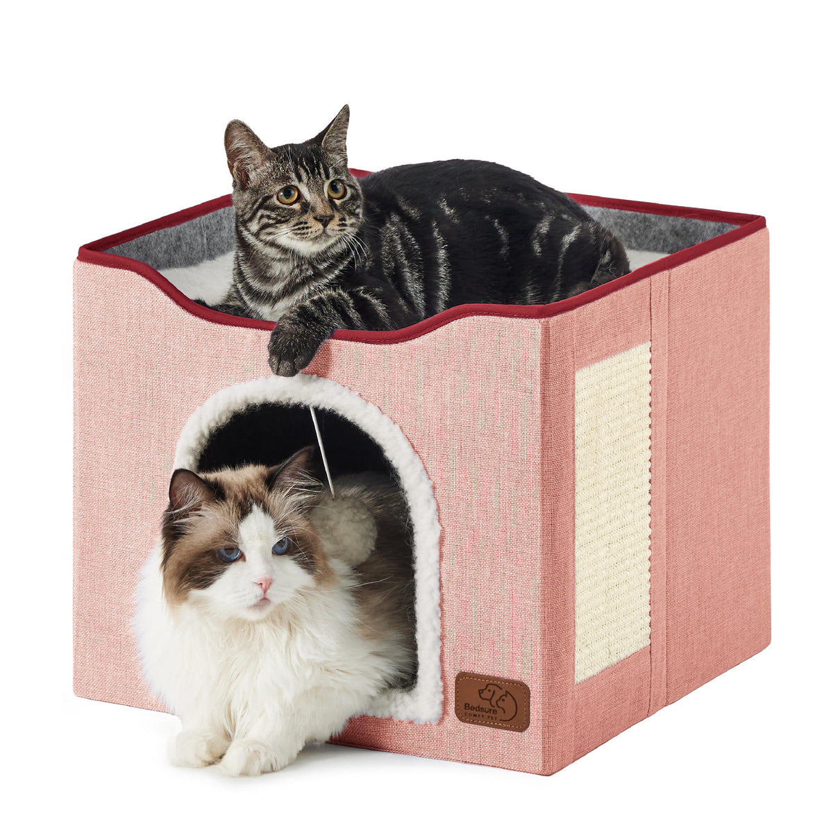 Bedsure large cat cave pink front view showing cozy indoor lounging.