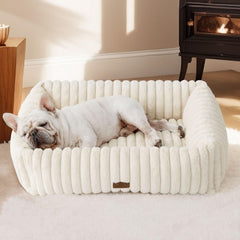 Bedsure ComfyFleece dog bed in cream offers warm, plush comfort for naps.