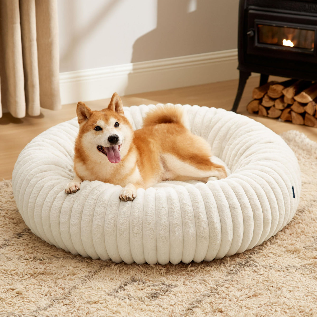 Bedsure ComfyFleece Donut Bed cream with plush faux fur for cozy naps