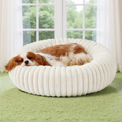 Bedsure ComfyFleece donut bed cream close-up with plush faux fur for cozy lounging