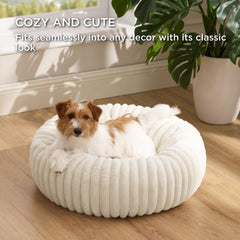 Bedsure ComfyFleece donut bed, faux fur texture, delivers warm, luxurious softness.
