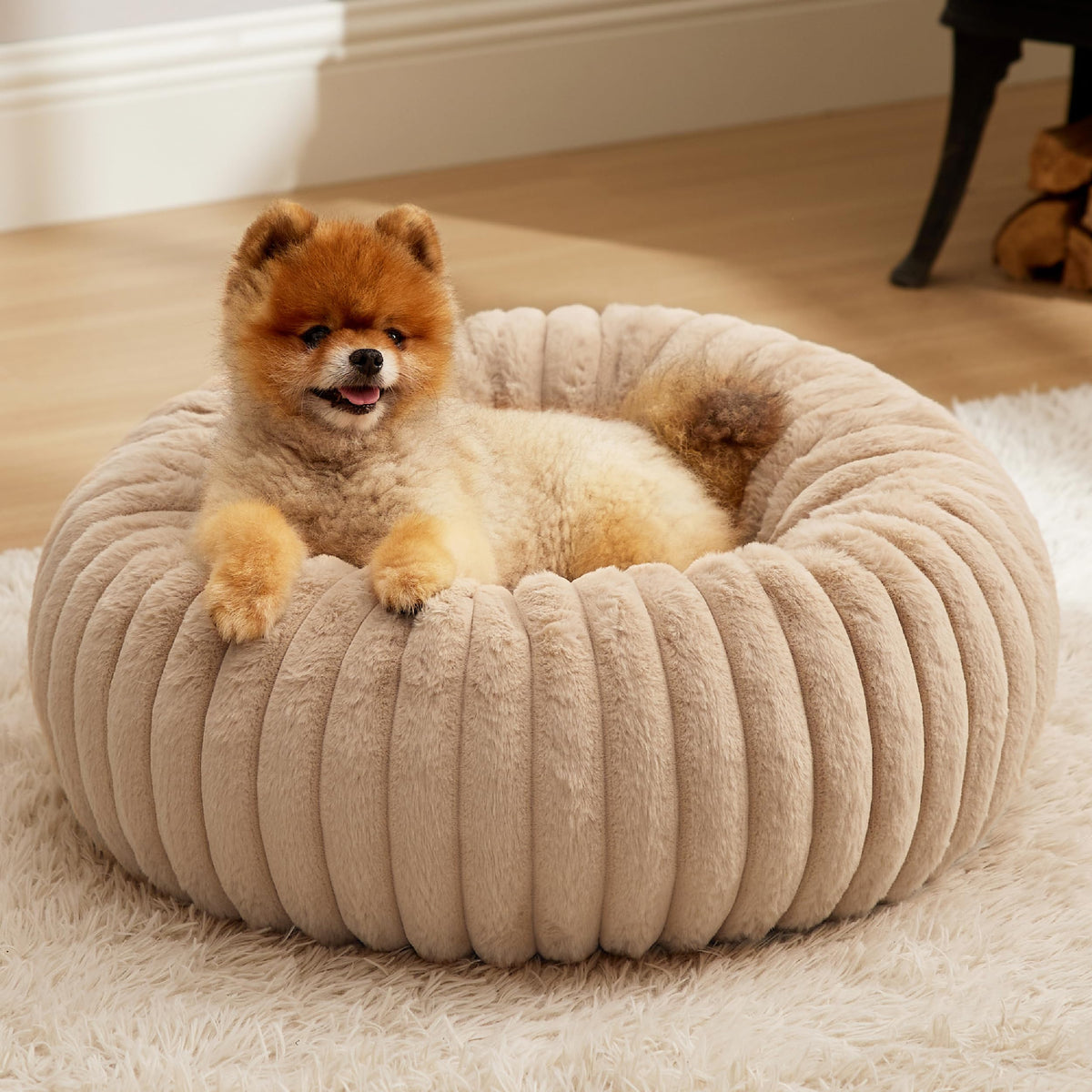 Bedsure ComfyFleece Donut bed with round faux-fur cover for cozy naps.