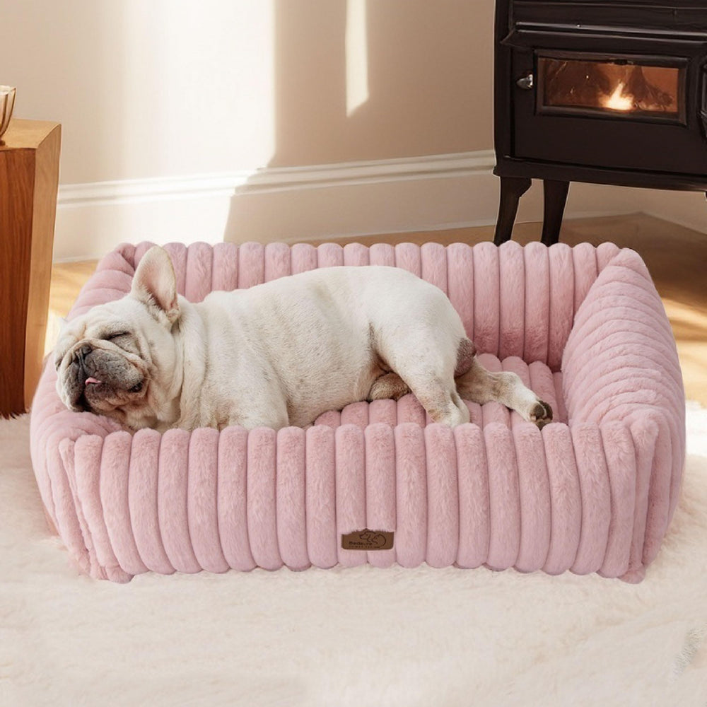 Bedsure ComfyFleece rectangle bed in blush pink with cozy warmth.