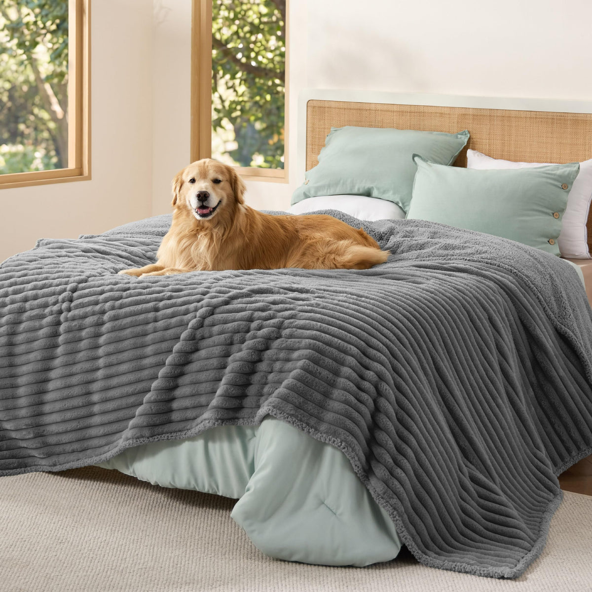 Bedsure ComfyFleece waterproof blanket on bed showing interior lining for spills