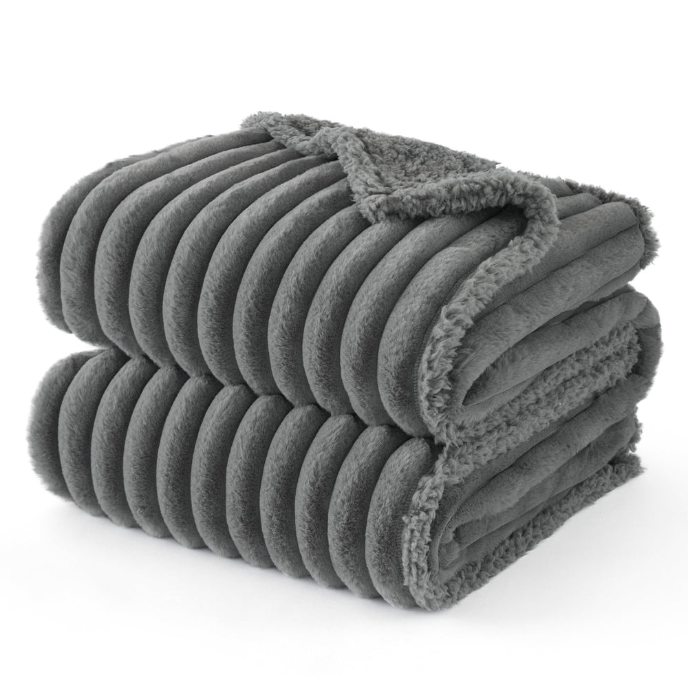 Bedsure ComfyFleece waterproof blanket on couch protects furniture from spills