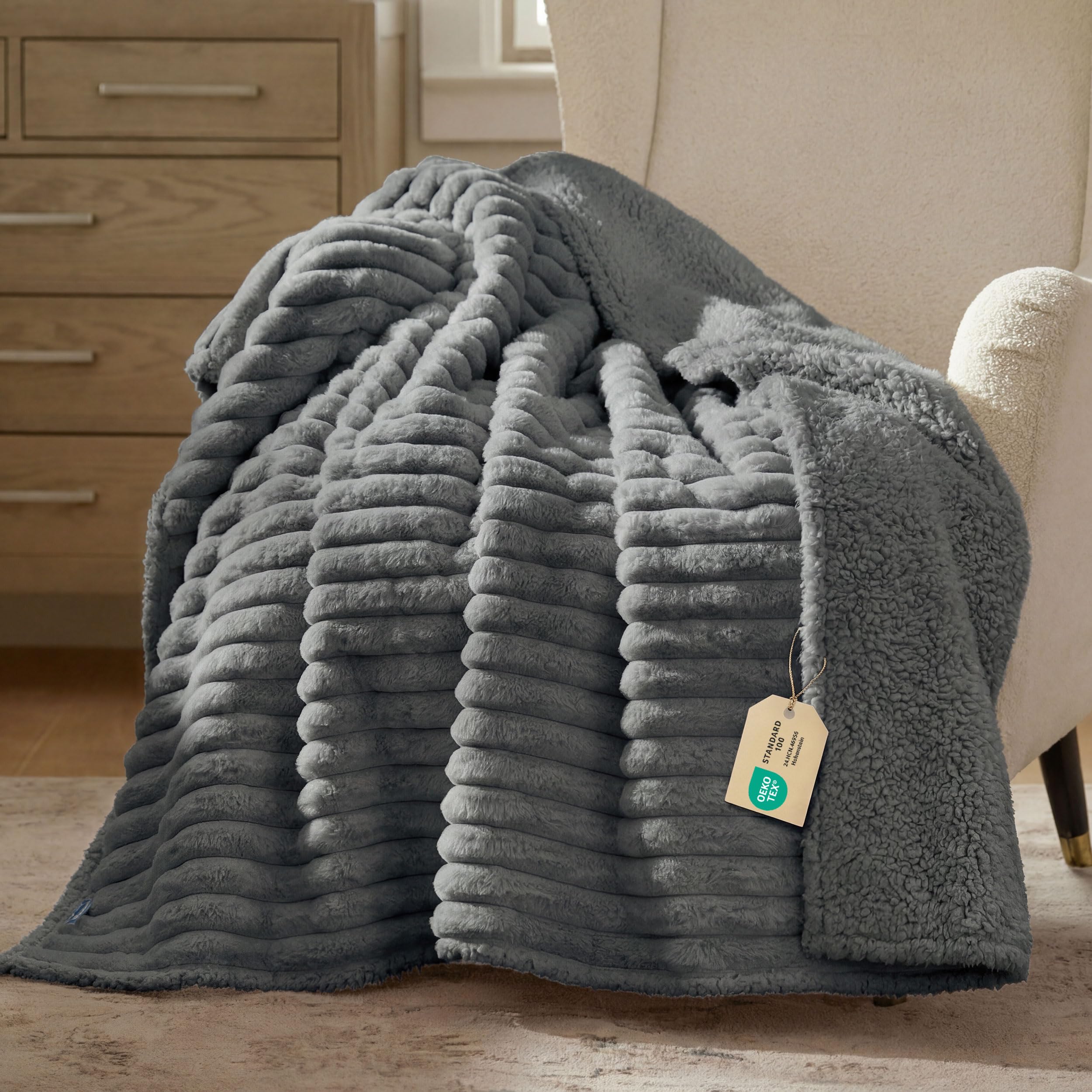 Bedsure ComfyFleece blanket on sofa guarding furniture from spills with waterproof interior