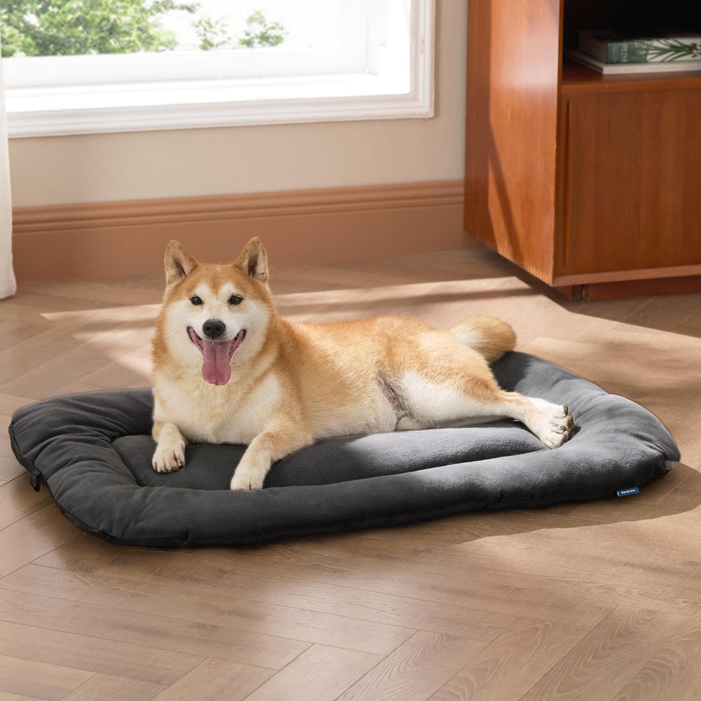 Bedsure crate pad on the floor ready for cozy lounging.