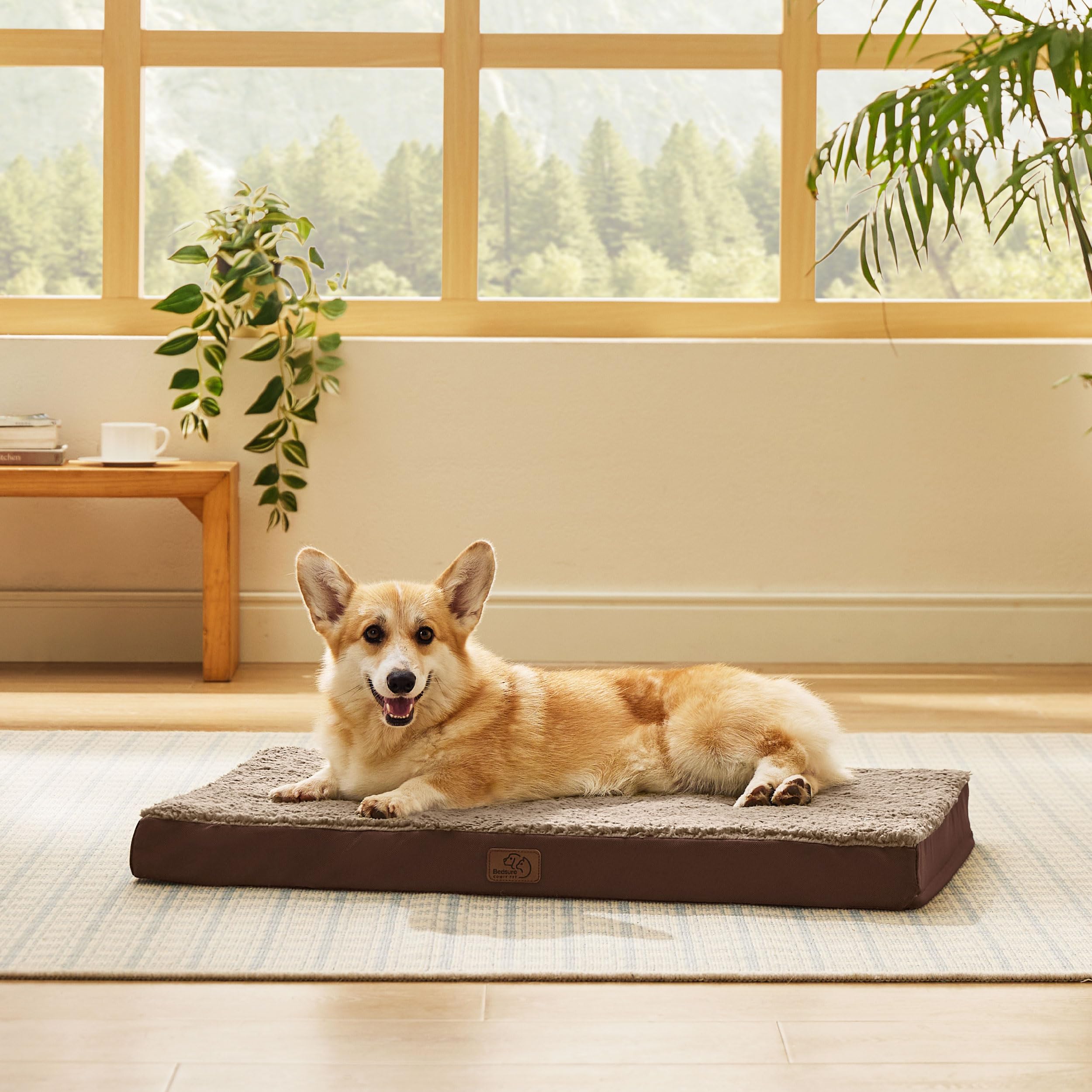 Bedsure large dog bed accommodates crate setups for cozy confinement.