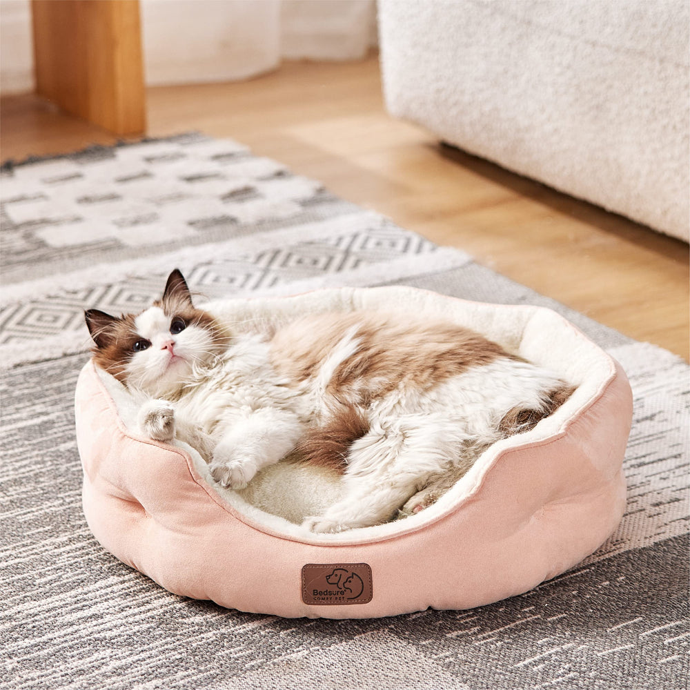 Bedsure dog bed with round bolster for secure, comfortable lounging.