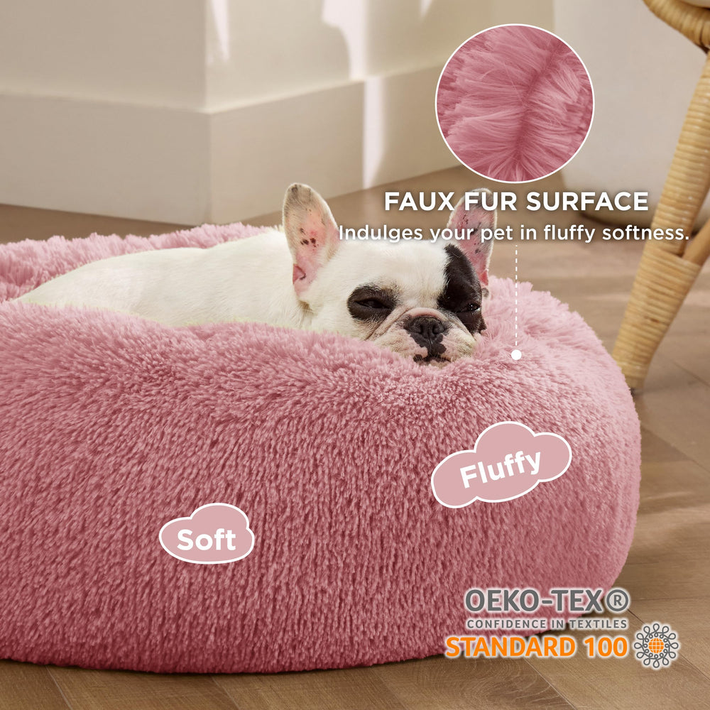 Bedsure donut bed's raised edge supports the head and neck for lounging.