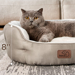 Bedsure pet bed with round bolster supporting head and neck for comfort