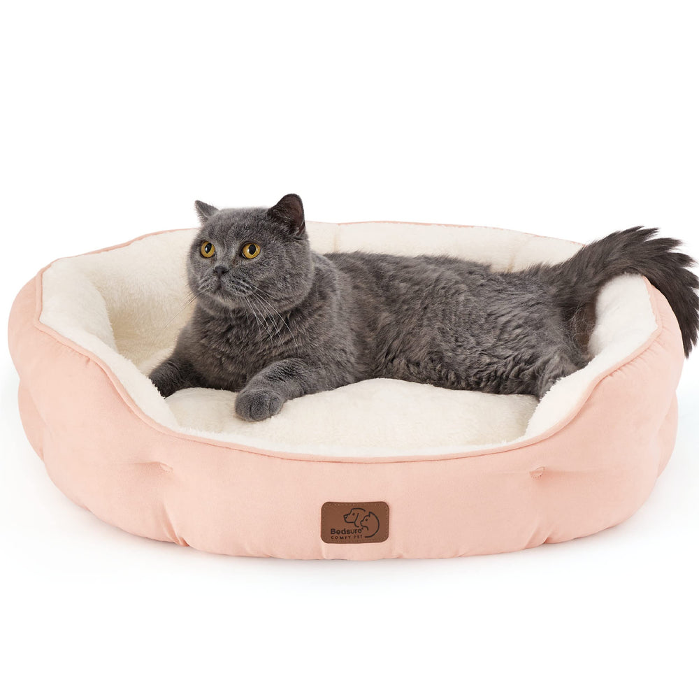 Bedsure round dog bed in pink, 25-inch diameter, ideal for small pets and cozy naps